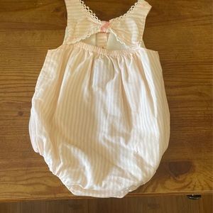 Baby girls size 3-6 months onesies.This hasnever been worn. Brand is piper posie